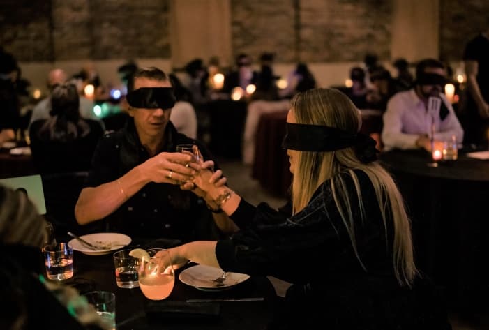 Diners at Dining in the Dark experience in Edmonton